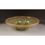 PROBABLY FRENCH, STYLISH GREEN DUSTED ART GLASS DISH, of flared, circular form with heavy, ribbed,