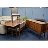 EIGHT PIECE GORDON RUSSELL WALNUT AND STAINED BEECH DINING ROOM SUITE, comprising: EXTENDING
