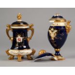 COPELAND TWO HANDLED CHINA VASE AND COVER, of tapering form with lion mask capped gilt handles and