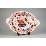 NINETEENTH CENTURY ENGLISH IMARI PORCELAIN TWO HANDLED TUREEN STAND, of oval form with raised border