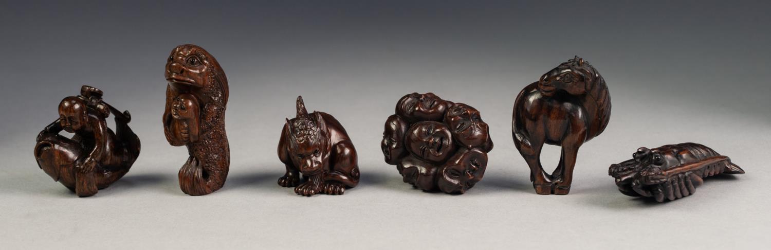 SEVEN VARIOUS TWENTIETH CENTURY JAPANESE WELL CARVED HARDWOOD NETSUKE, (7)