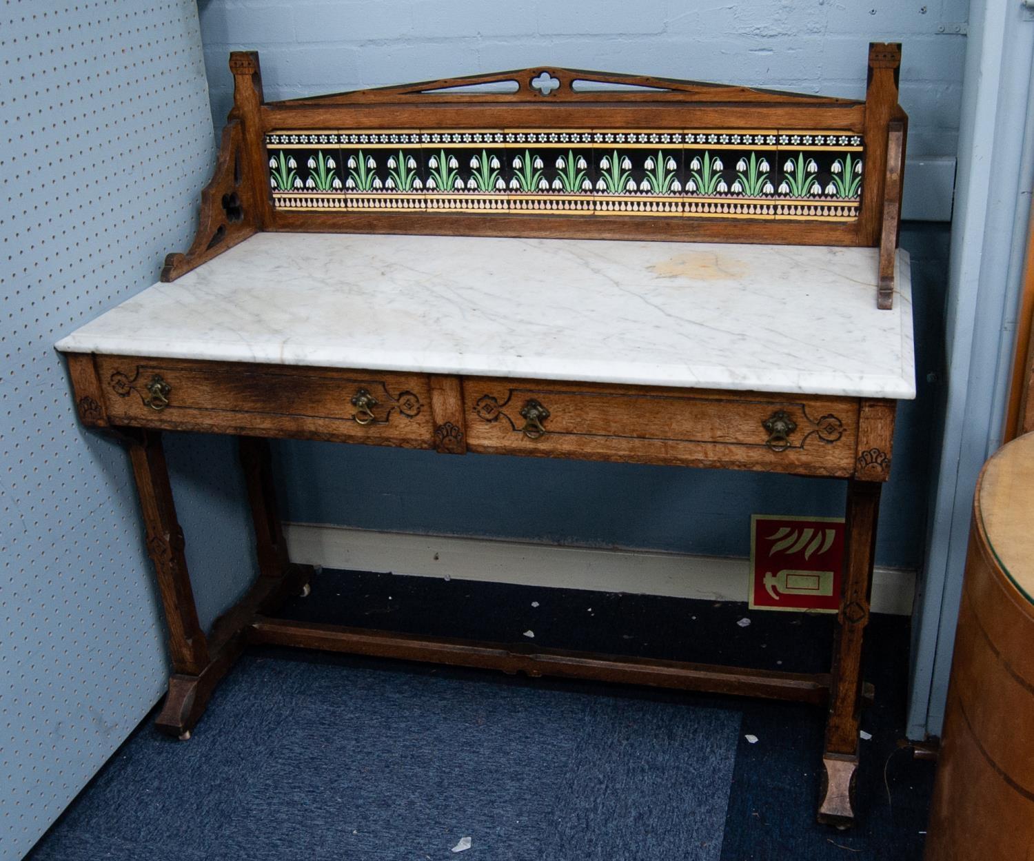 VICTORIAN GOTHIC REVIVAL MARBLE TOPPED AND TILED BACKED OAK WASHSTAND, the oblong white veined