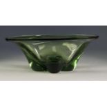 GREEN ART GLASS BOWL, of oval, steep sided form, with quatrefoil base, 4 ¼? (10.8cm) high, 11 ½? x 8