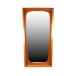 1960s/1970s DANISH WOODEN FRAMED WALL MIRROR of tapered vertical form, 28 3/4in (73cm) high, 15 3/