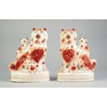 PAIR OF RARE NINETEENTH CENTURY STAFFORDSHIRE FLAT BACK POTTERY DOG GROUPS, each modelled as a