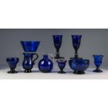NINE PIECES OF NINETEENTH CENTURY AND LATER BRISTOL BLUE GLASS, including: A HEAVY PAIR OF STEMMED