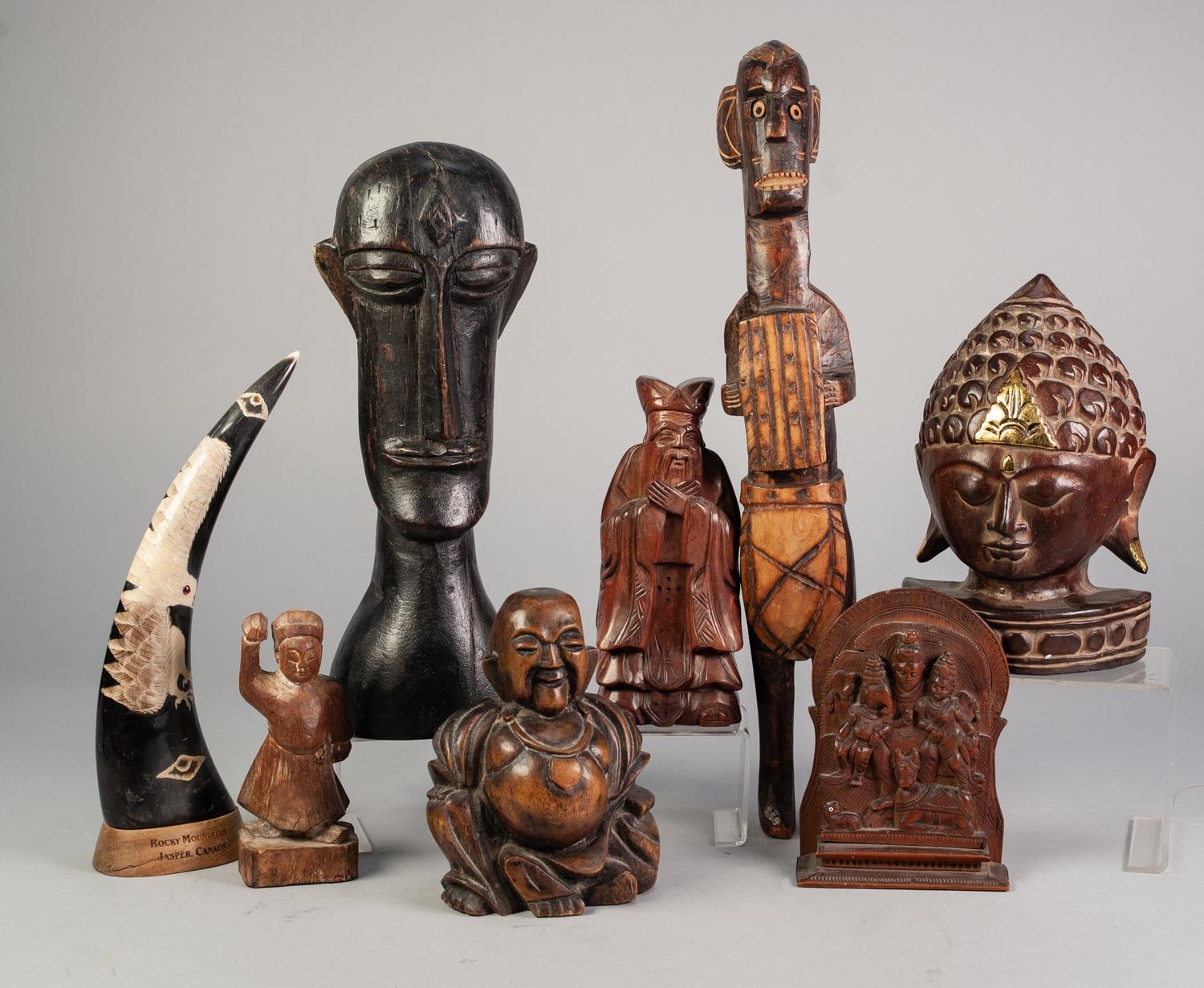 COLLECTION OF SEVEN EASTERN AND AFRICAN CARVED WOODEN FIGURES, including, an ORIENTAL RED WOOD