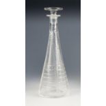 STYLISH CUT GLASS DECANTER AND STOPPER, of tapering form, wheel cut with wavy lines overlaid with