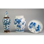 CHINESE BLUE AND WHITE CRACKLE GLAZED PORCELAIN VASE AND COVER, of slender ovoid form with dog of fo