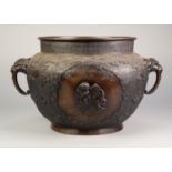 LARGE, PROBABLY JAPANESE CAST BRONZE JARDINIERE WITH CHIMERICAL MASK HANDLES, the body with opposing