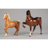 TWO BESWICK GLOSS POTTERY MODELS OF PRANCING ARAB HORSES, comprising: PRANCING ARAB, HEAD TUCKED UP,