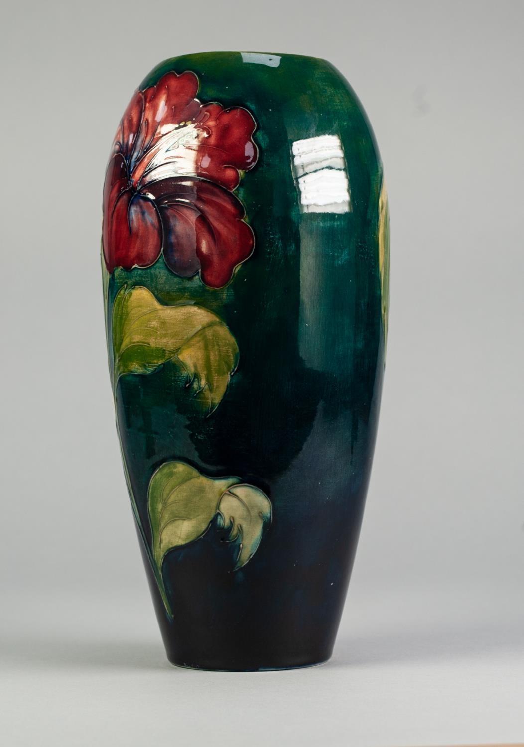 WALTER MOORCROFT HIBISCUS PATTERN TUBE LINED POTTERY VASE, of slender ovoid form, painted in tones - Image 4 of 5