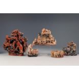 FIVE ORIENTAL CARVED SOAPSTONE GROUPS, comprising: THREE RECEIVER GROUPS CARVED WITH MONKEYS,