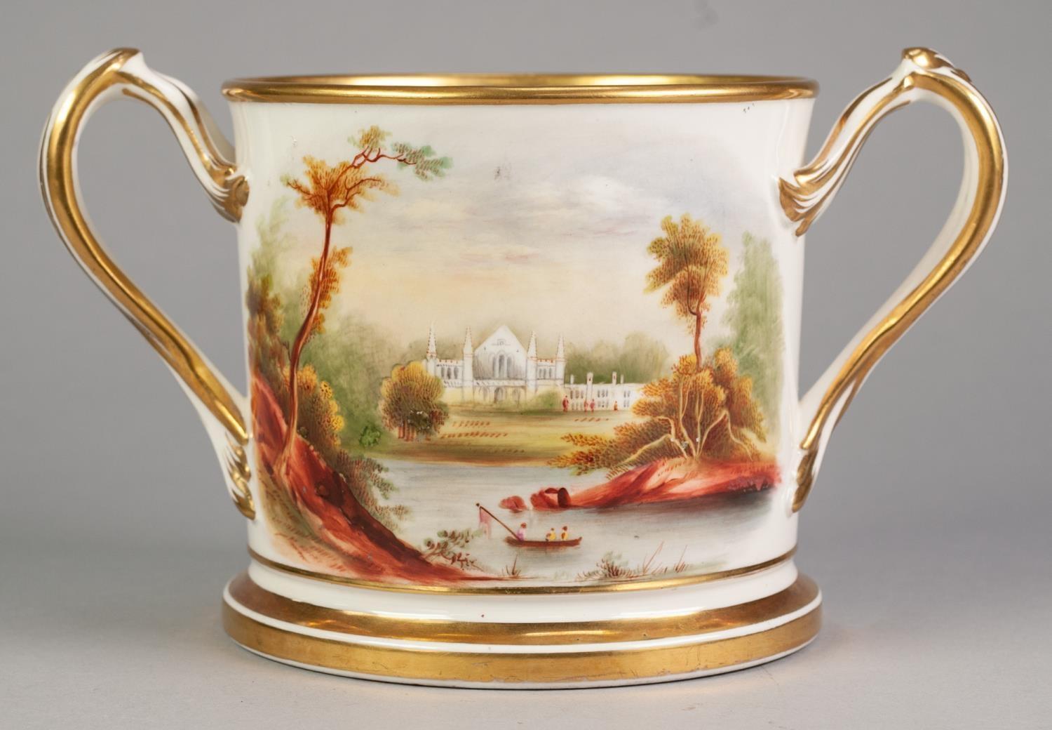 VICTORIAN PRESENTATION CHINA TWO HANDLED LARGE LOVING CUP, of typical form with entwined scroll