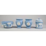 FOUR SMALL PIECES OF WEDGWOOD PALE BLUE JASPERWARE, all applied in whi