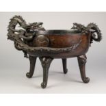 JAPANESE MEIJI PERIOD CAST BRONZE SHALLOW BOWL, the exterior engraved with mallow leaves and applied