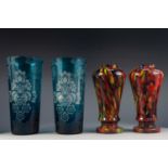 PAIR OF ENGRAVED PALE BLUE GLASS LARGE VASES, each of tapering form, wheel cut with flowers,