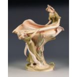 ART NOUVEAU ROYAL DUX PORCELAIN PEDESTAL RECEIVER GROUP, painted in muted tones and gilt an