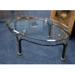 MODERN GUN COLOURED METAL AND BRASS COFFEE TABLE WITH GLASS TOP, the oval, bevel edged top, raised
