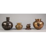 MIDDLE EASTERN BRASS AND COPPER POT, of baluster form with three peg feet, decorated with a panelled