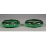 PAIR OF SCOTTISH, MONART LABELLED, SHALLOW GLASS DISHES, green mottled, with turned-in rims, with