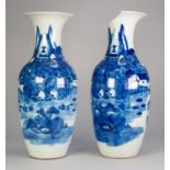 PAIR OF ORIENTAL BLUE AND WHITE PORCELAIN LARGE VASES, each of Indian club form, outlined and washed