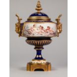 NINETEENTH CENTURY HAND PANTED ?SEVRES? PORCELAIN AND ORMOLU MOUNTED TWO HANDLED PEDESTAL URN AND