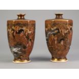 PAIR OF JAPANESE MEIJI PERIOD SATSUMA ?THOUSAND FACES? POTTERY VASES, each of tapering hexagonal