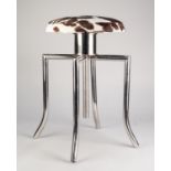 MODERN WHITE METAL AND COWSKIN ADJUSTABLE PIANO STOOL, with four splayed legs and padded, circular