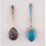 AN IMPERIAL RUSSIAN SILVER GILT (.84 Zolotniks) AND CLOISONNE ENAMEL SPOON, 4" (10cm) long, ALSO A