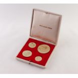 FOUR CHURCHILL 18ct GOLD COMMEMORATIVE MEDALLIONS, in case