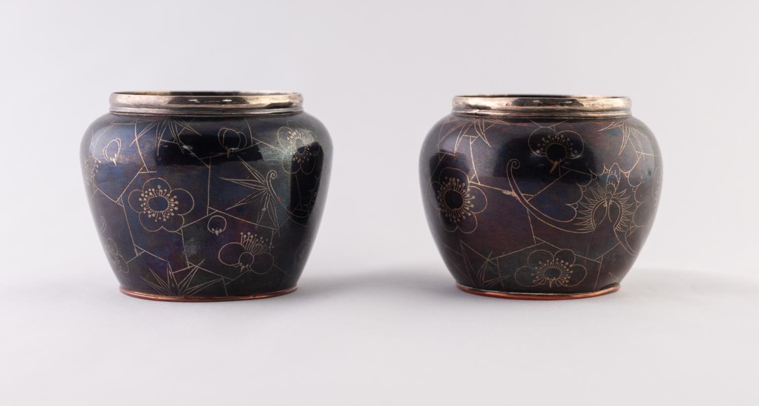 A GOOD QUALITY PAIR OF SMALL JAPANESE MEIJI PERIOD COPPER ALLOY SMALL BOWLS, the patinated bodies