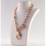 9ct GOLD LARGE GRADUATED CURB LINK ALBERT CHAIN, with T-bar, clip and 9ct gold sports medallion,