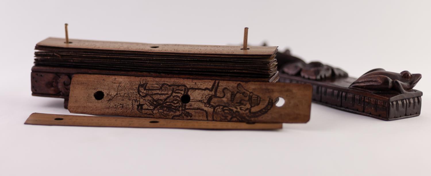 AN UNUSUAL LATE 19TH CENTURY PERUVIAN BOOK, formed of sixteen thin wooden hand written leaves held - Image 4 of 5