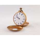 18k GOLD LADY'S DEMI HUNTER POCKET WATCH, with keyless movement, white porcelain roman dial, the