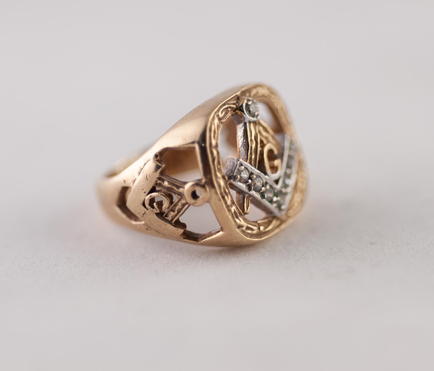 9ct GOLD WHITE SAPPHIRE MASONIC RING with pierced and paste set Masonic motif, ring size O, 9g - Image 2 of 2