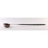 A GEORGE III SILVER TODDY LADLE, the bowl repousse with shell-work, twisted baleen handle, the