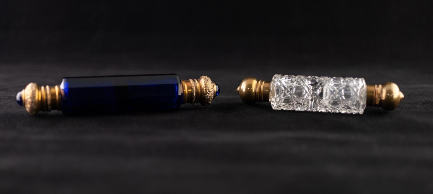 A VICTORIAN FACETED SAPPHIRE BLUE GLASS GILT METAL MOUNTED DOUBLE ENDED SCENT BOTTLE, 6" (15.5cm)