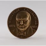 JOHN PINCHES LTD., 9ct GOLD CHURCHILL COMMEMORATIVE PORTRAIT MEDALLION (1874 - 1965), 1 1/2" (3.8cm)