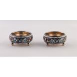 A PAIR OF SMALL IMPERIAL RUSSIAN SILVER (.84 zolotniks) AND CLOISONNE ENAMEL SALT CELLARS