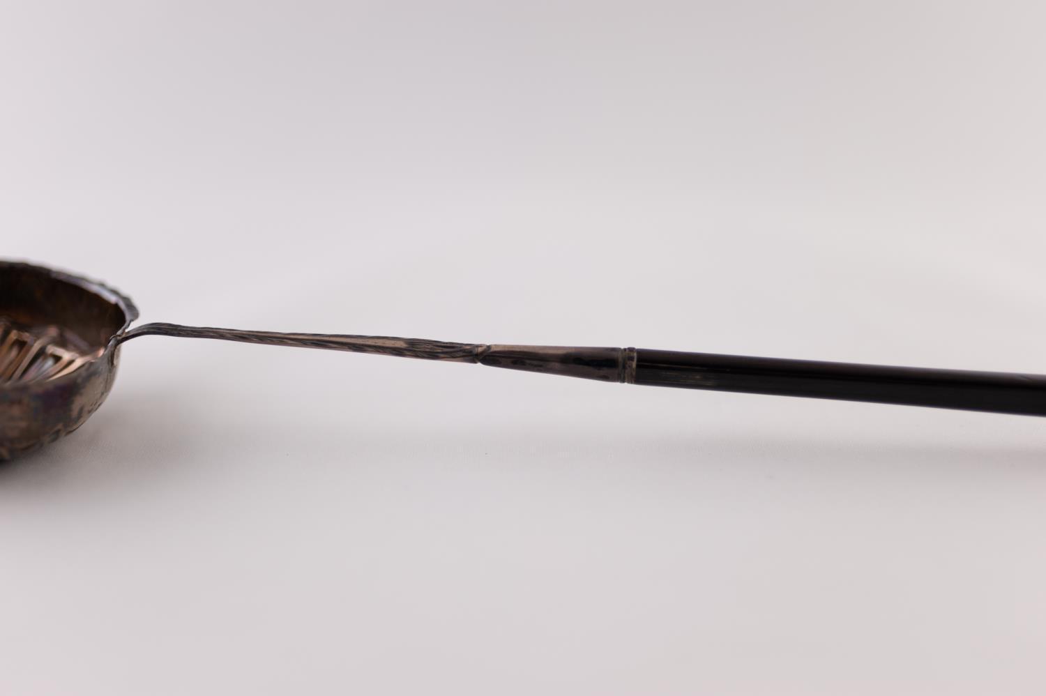 A GEORGE III SILVER TODDY LADLE, the bowl repousse with shell-work, twisted baleen handle, the - Image 5 of 5