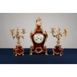 CIRCA 1900 FRENCH ROCOCO REVIVAL TORTOISESHELL AND ORMOLU MOUNTED CLOCK GARNITURE, the movement