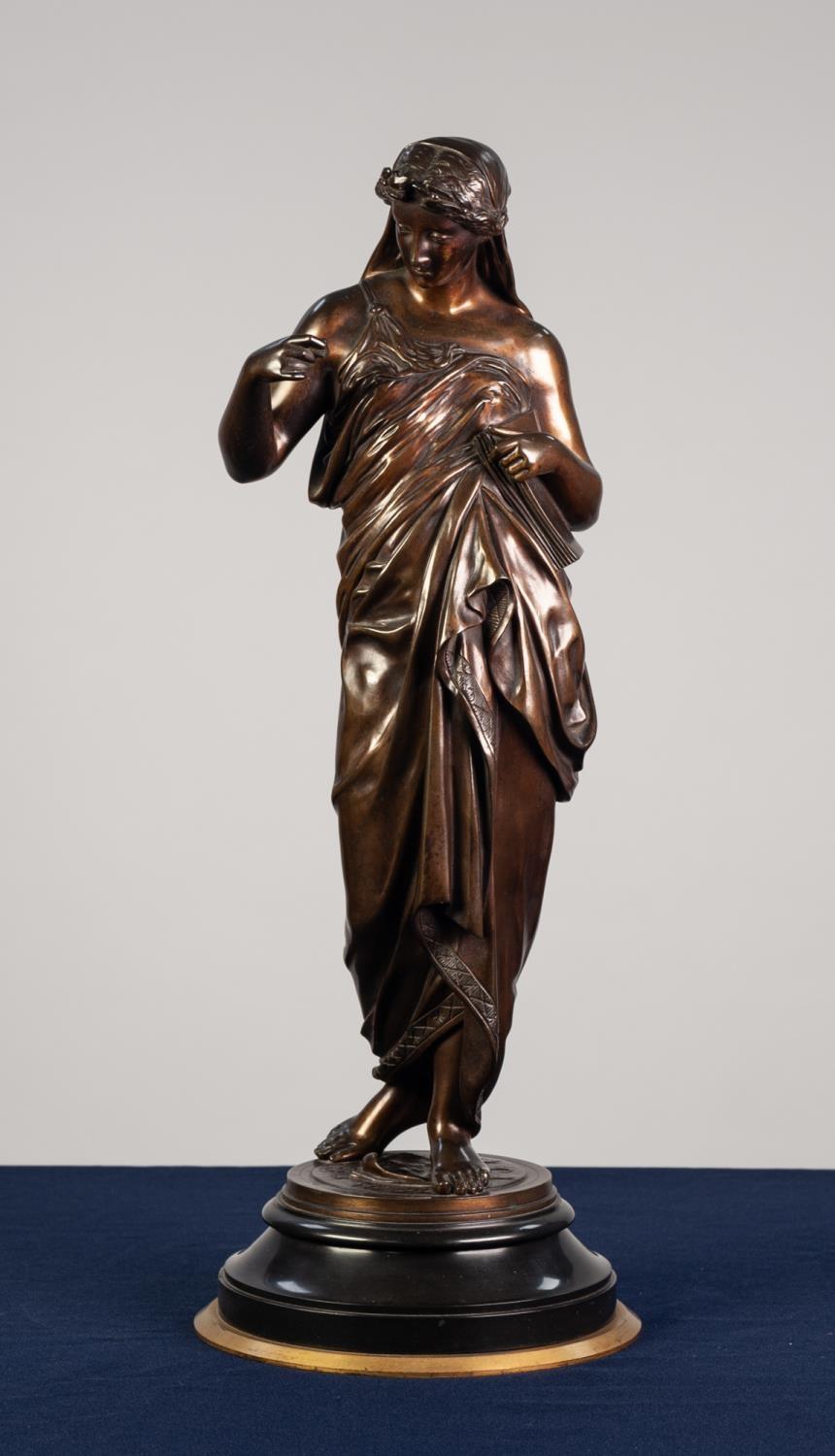 NINETEENTH CENTURY BRONZE CLASSICAL FEMALE FIGURE, modelled standing in flowing dress, carrying a