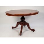 VICTORIAN MAHOGANY TILT-TOP BREAKFAST TABLE, the moulded oval top above a plain frieze and heavy