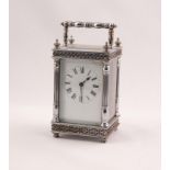 20TH CENTURY ENGLISH CARRIAGE CLOCK IN CHROMIUM PLATED CASE WITH TURNED AND FLUTED CORNER PILLARS,