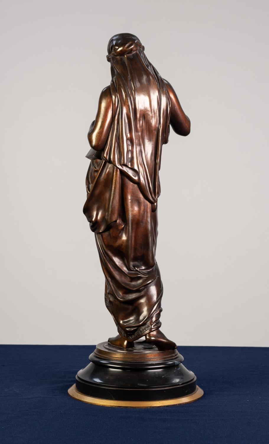 NINETEENTH CENTURY BRONZE CLASSICAL FEMALE FIGURE, modelled standing in flowing dress, carrying a - Image 2 of 3
