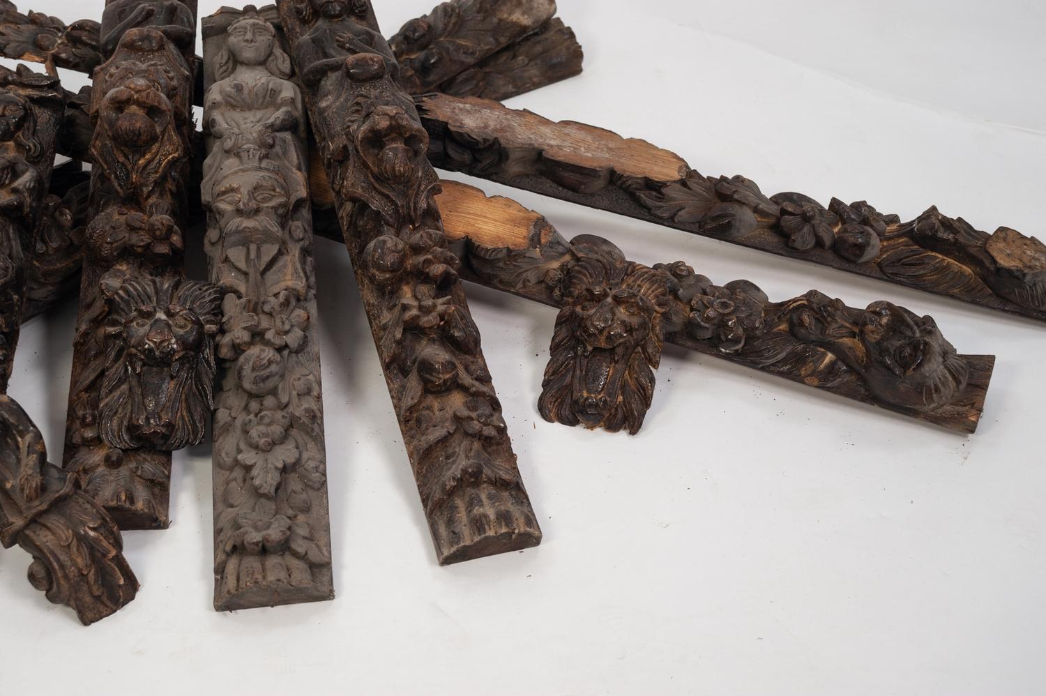 ?TWO SETS OF FOUR LATE NINETEENTH CENTURY FLEMISH CARVED OAK CAPPING OR FACING PIECES, each of - Image 3 of 5