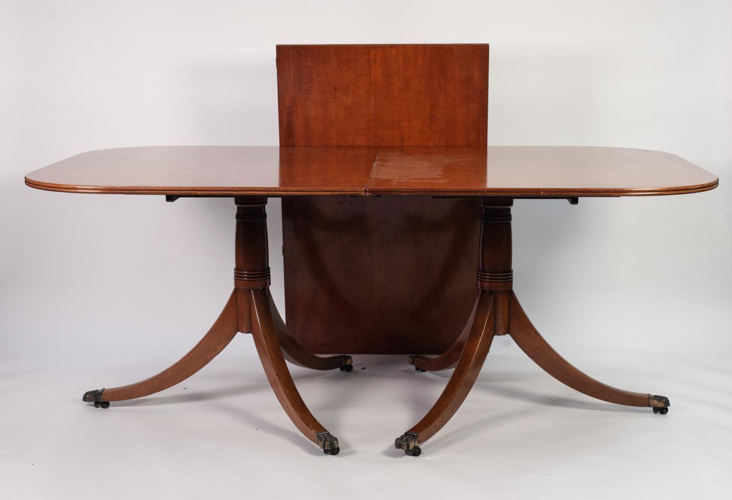 MODERN REGENCY STYLE MAHOGANY TWIN PILLAR DINING TABLE WITH EXTRA LEAF AND A SET OF SIX SINGLE