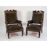 PAIR OF EDWARDIAN WALNUTWOOD LADIES AND GENTS DRAWING ROOM ARMCHAIRS, COVERED IN GREEN FABRIC,