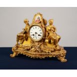 19th CENTURY FRENCH ORMOLU CASED MANTEL CLOCK, the white enamel roman dial surmounted with an oval
